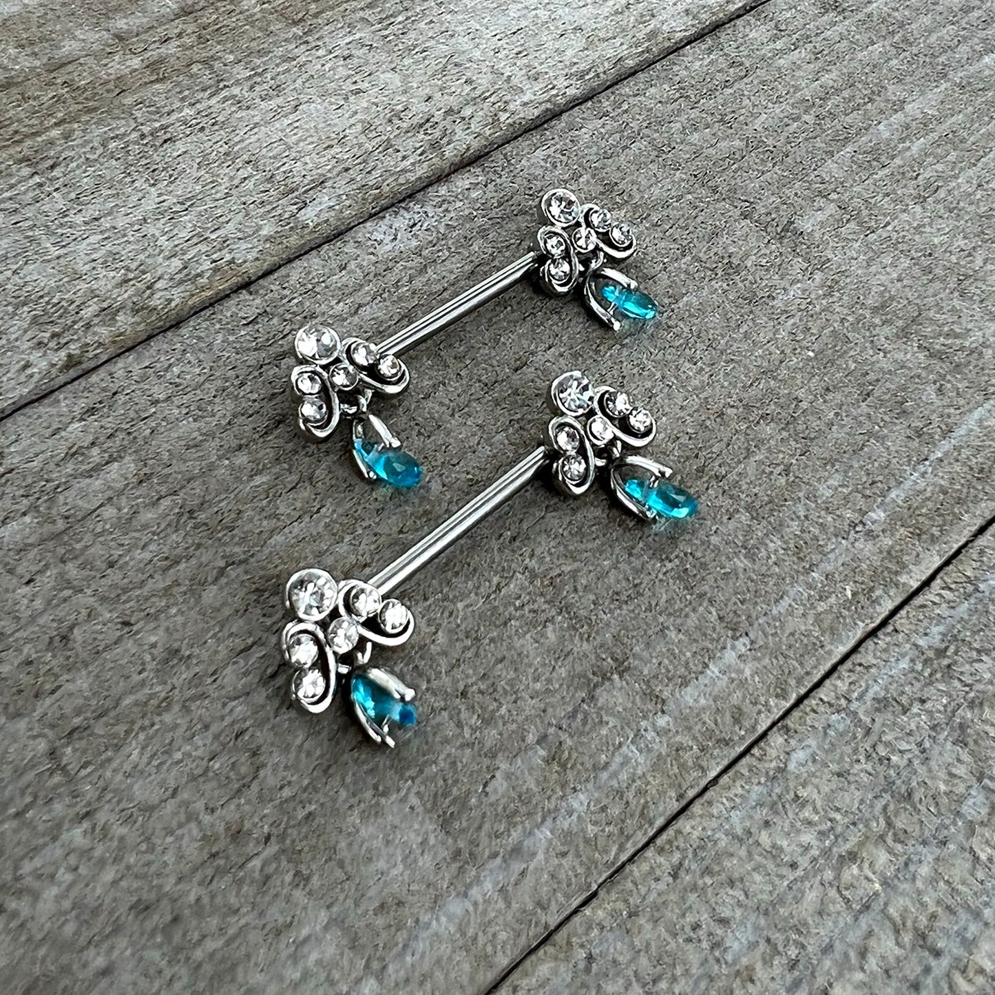 14G 9/16 Blue Gem Scrolling Elegance Dangle Nipple Ring Set