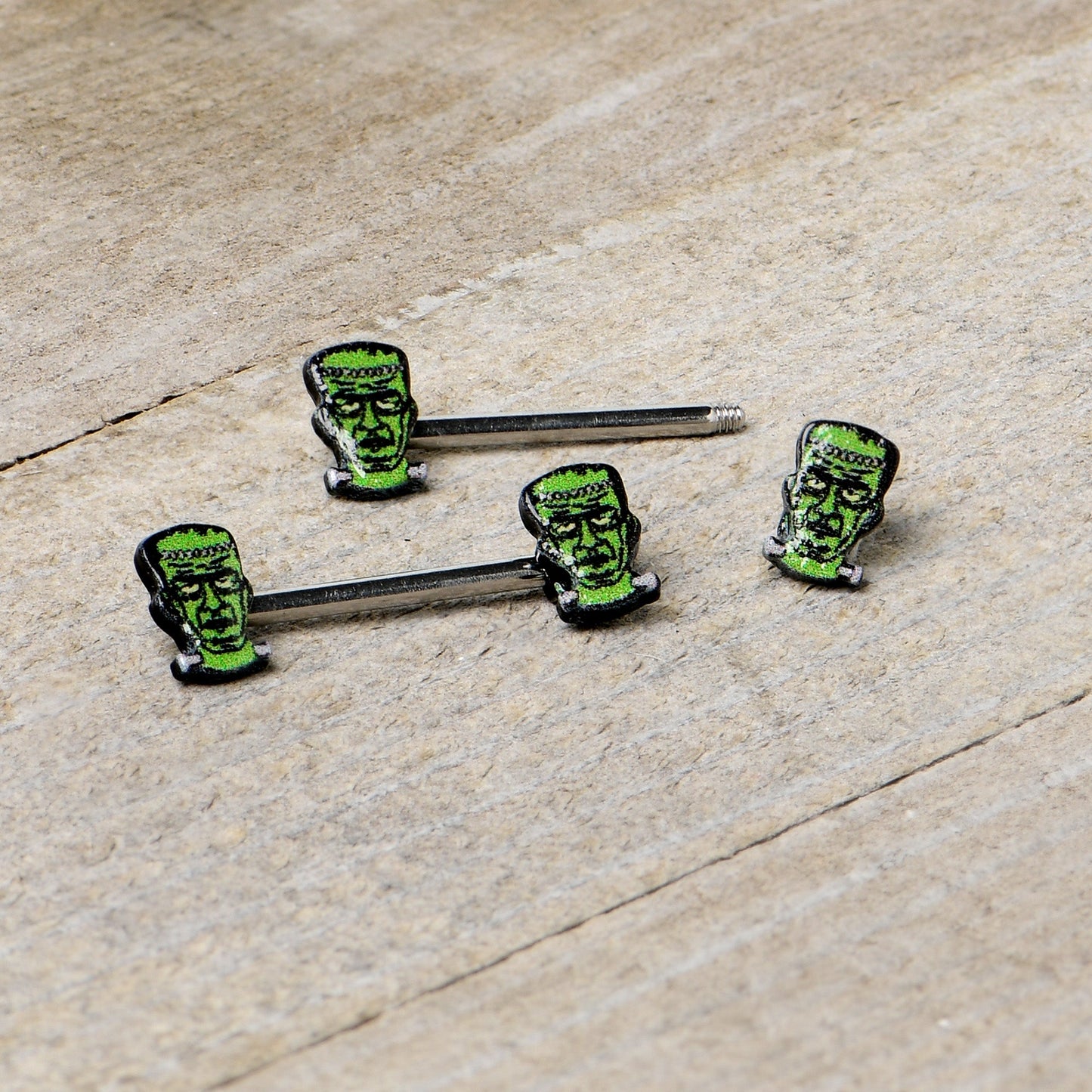 14G 9/16 Frankenstein Head Green Glow in the Dark Nipple Ring Set