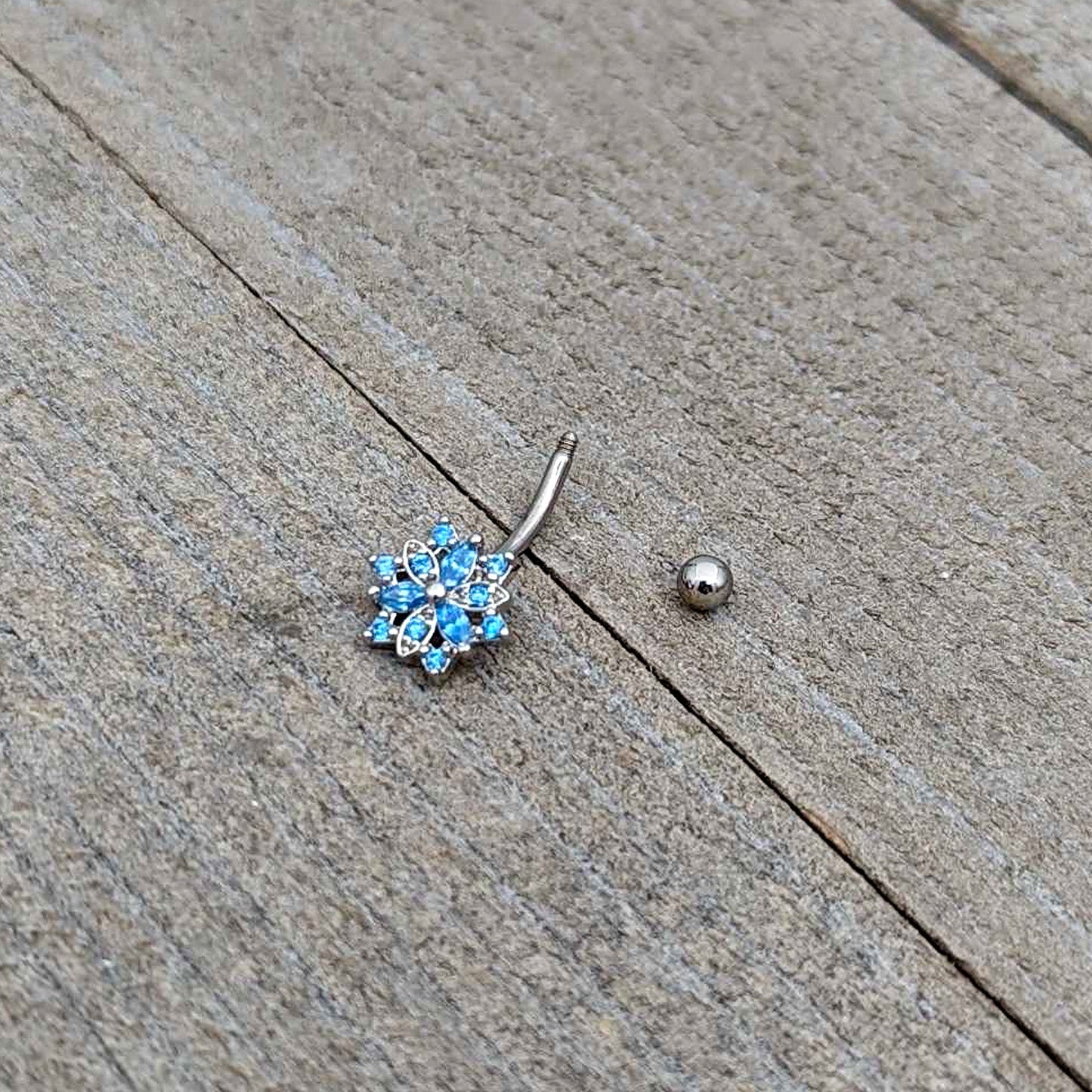 16G 5/16 Blue CZ Gem Snowflake Blues Curved Eyebrow Ring