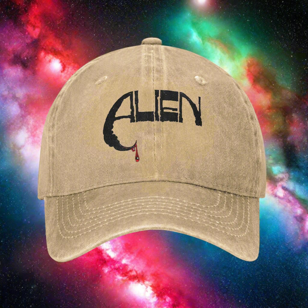 Beige cap with 'ALIEN' logo on a white background