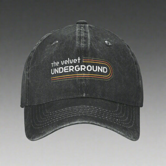 Black distressed cap with 'the velvet UNDERGROUND' logo on a white background