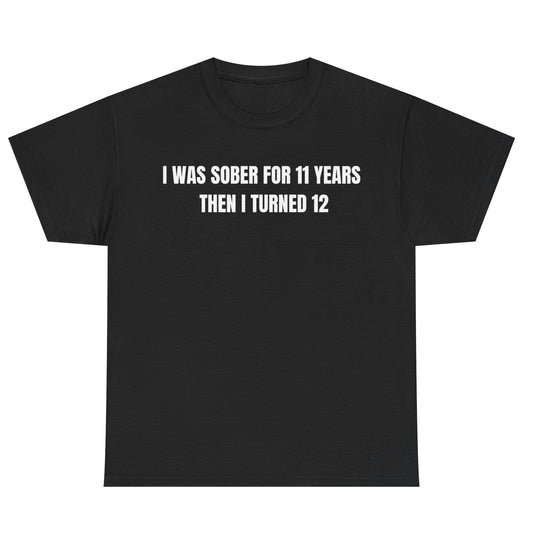 Black t-shirt with white text on a white background