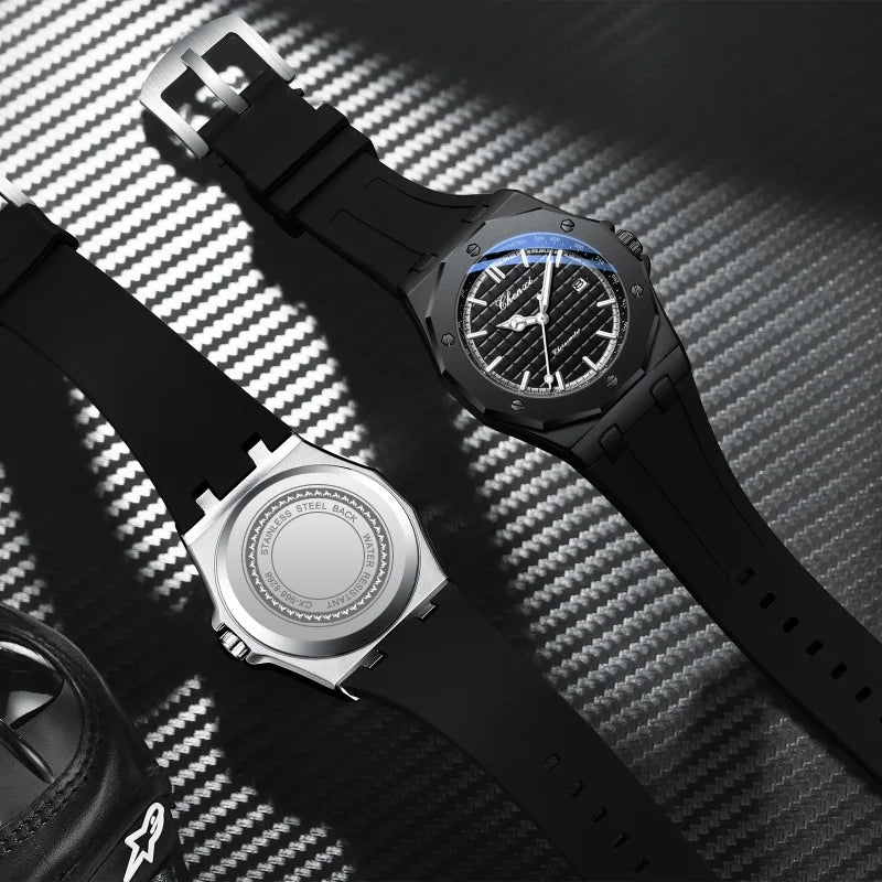 Black watch with a detailed face on a carbon fiber background