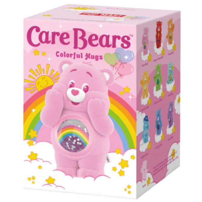 Care Bears toy packaging with a pink bear holding a rainbow, on a white background