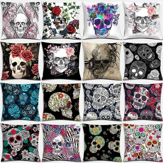Collection of decorative pillows with skull and floral designs.