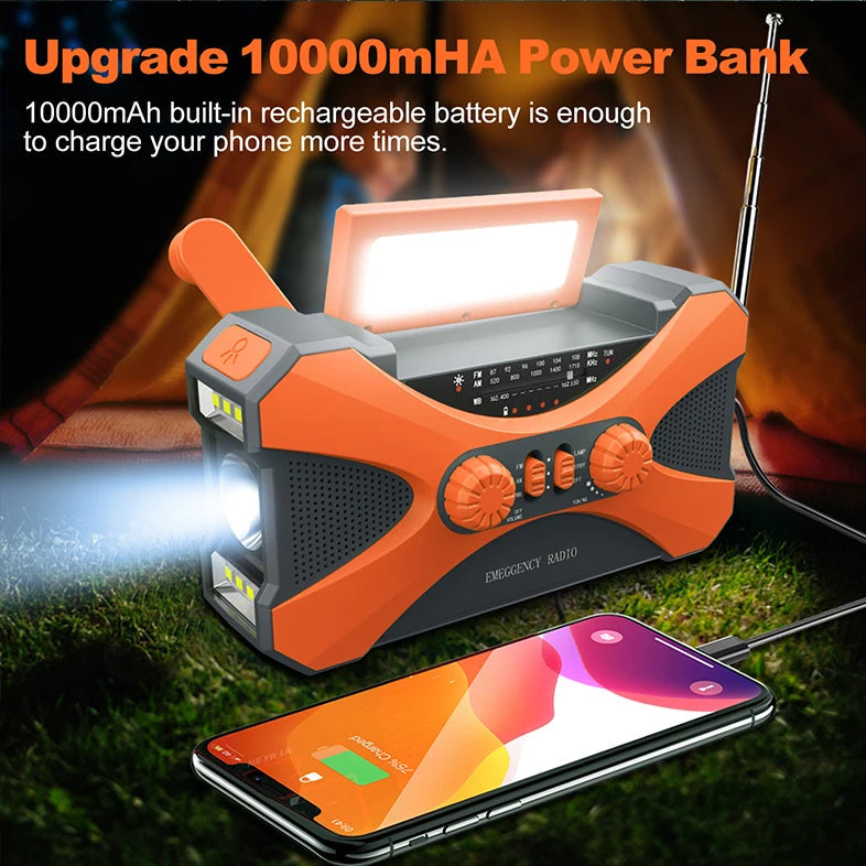 Orange power bank with flashlight and radio功能, charging a phone, on grass with fire background.