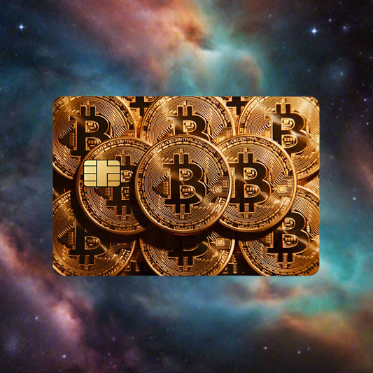 Gold Bitcoin coins on a card with a black and white background