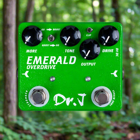 Green guitar effects pedal with 'Emerald Overdrive' and 'Dr. J' branding on a white background
