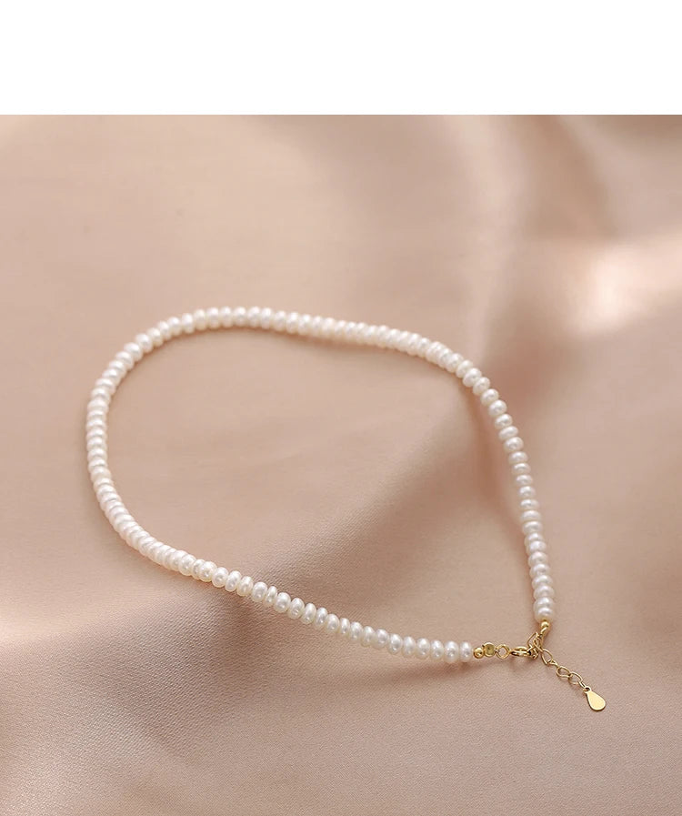 “KISS THE CROWN – 925 Gold-Dipped Freshwater Pearl Choker for Rebels in Silk & Smoke” | Lizard Vigilante Fine Jewelry Exclusive - Premium pearls from dsers - Just $103.99! Shop now at Lizard Vigilante