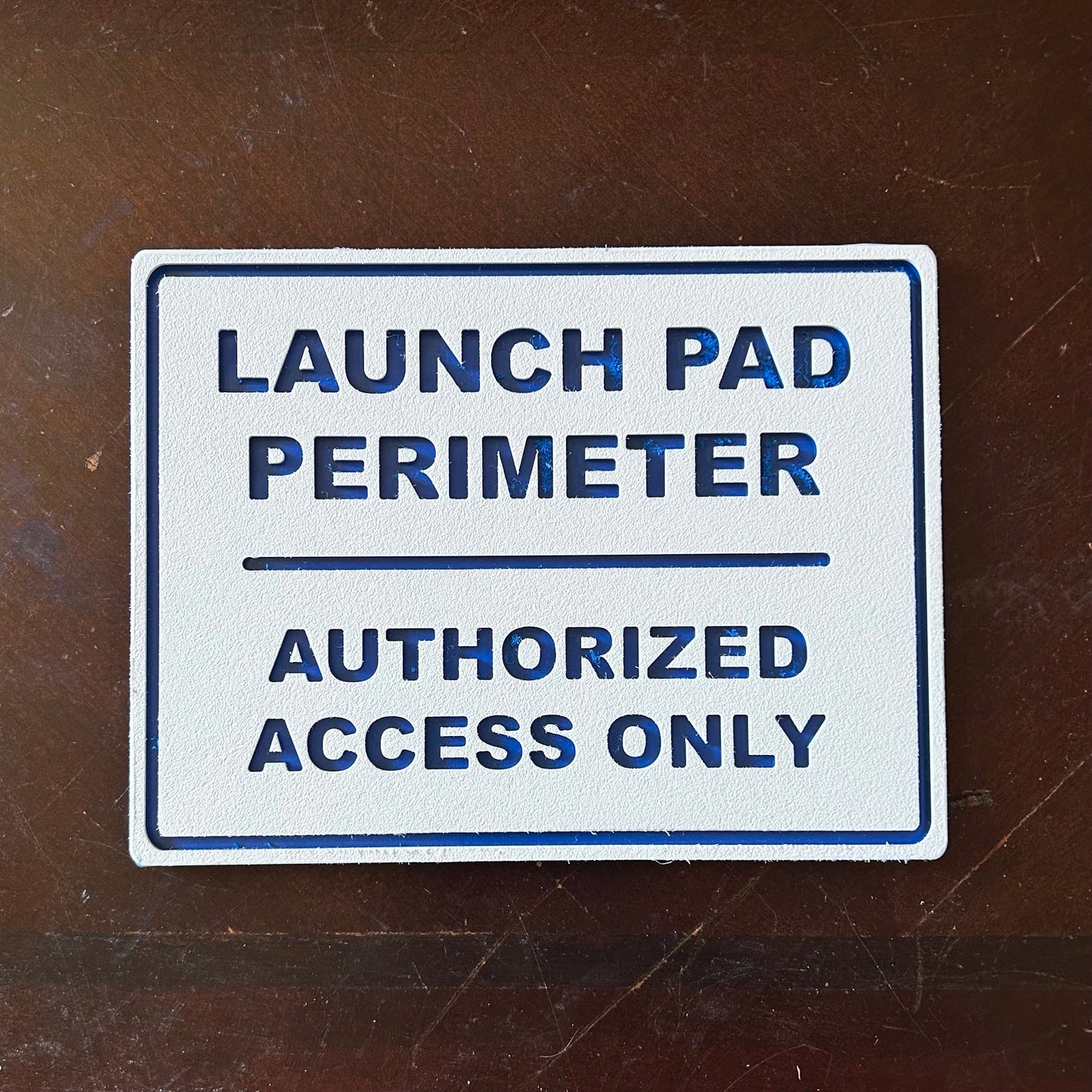 Launch Pad Perimeter Wall Sign