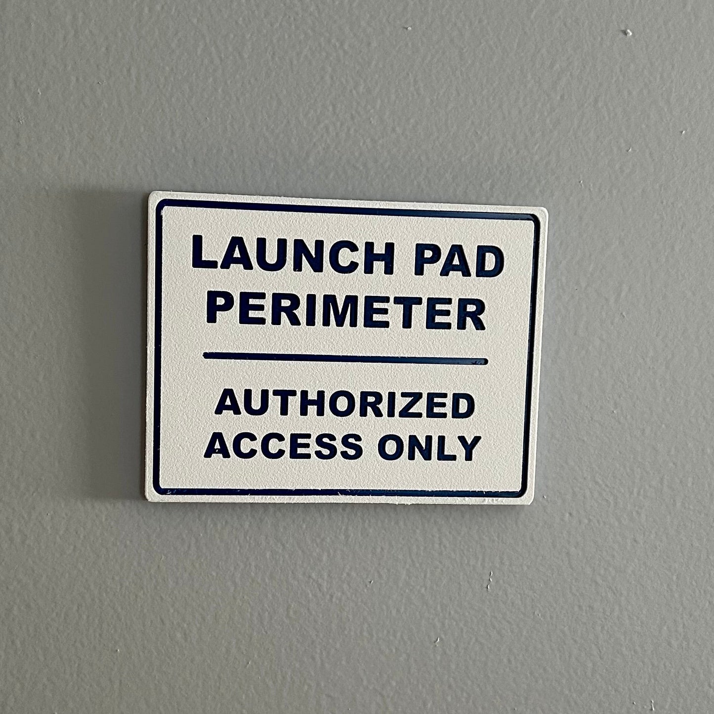 Launch Pad Perimeter Wall Sign