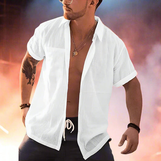 Man wearing a white open-front shirt over a black swimsuit on a white background

