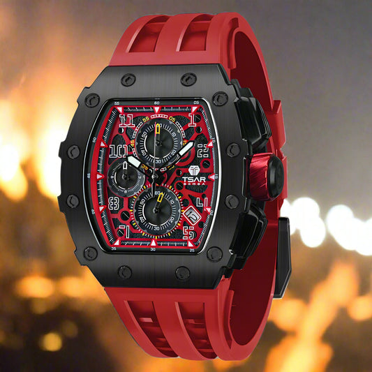 Red and black watch with detailed face on a white background, featuring the brand 'Tsar Bomba'.