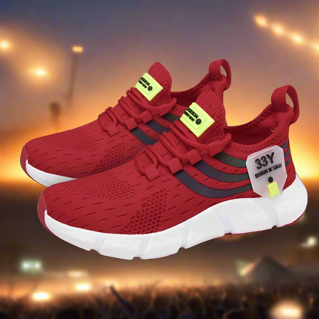 Red sneakers with white soles on a white background