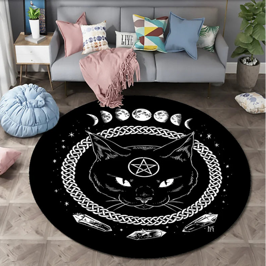 Round black rug with a cat design in a living room setting