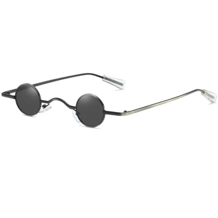 Round sunglasses with thin metal frame on a white background