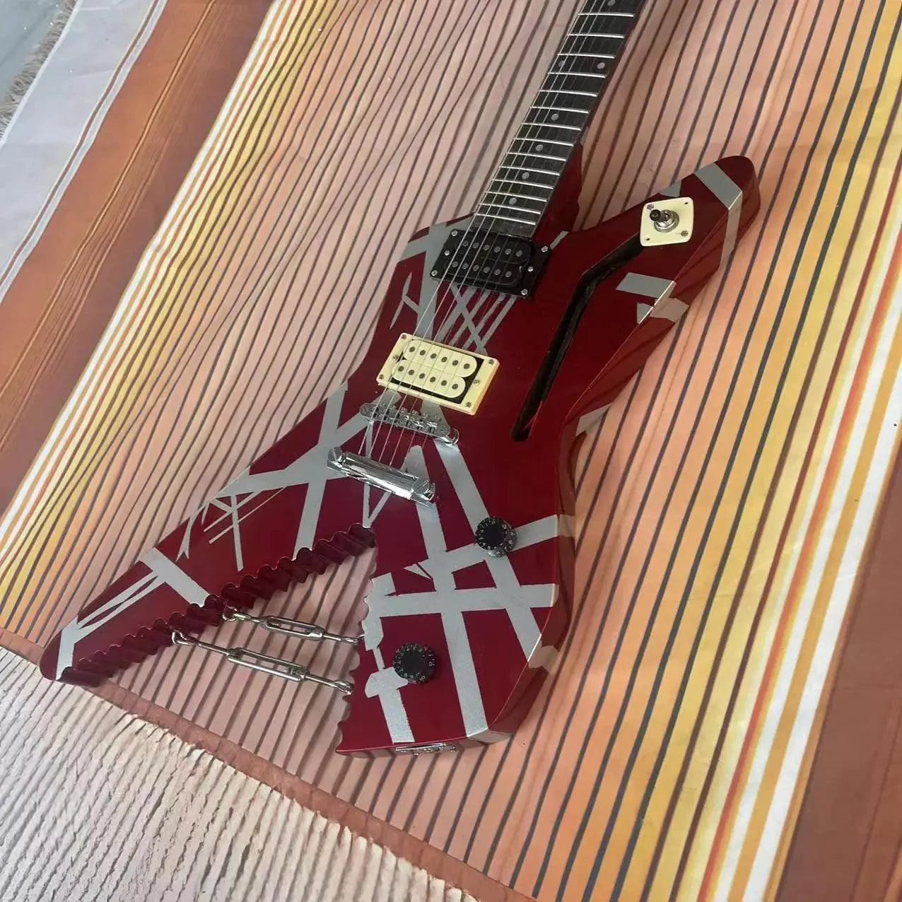 Red, White, & Black Striped Special Shaped 6-string Integrated Electric Guitar with a Eddie Van Metal Halen Red Body, High Gloss, Rosewood Fingerboard, Maple Wood Track - Premium Electric Guitar from dsers - Just $388.88! Shop now at Lizard Vigilante