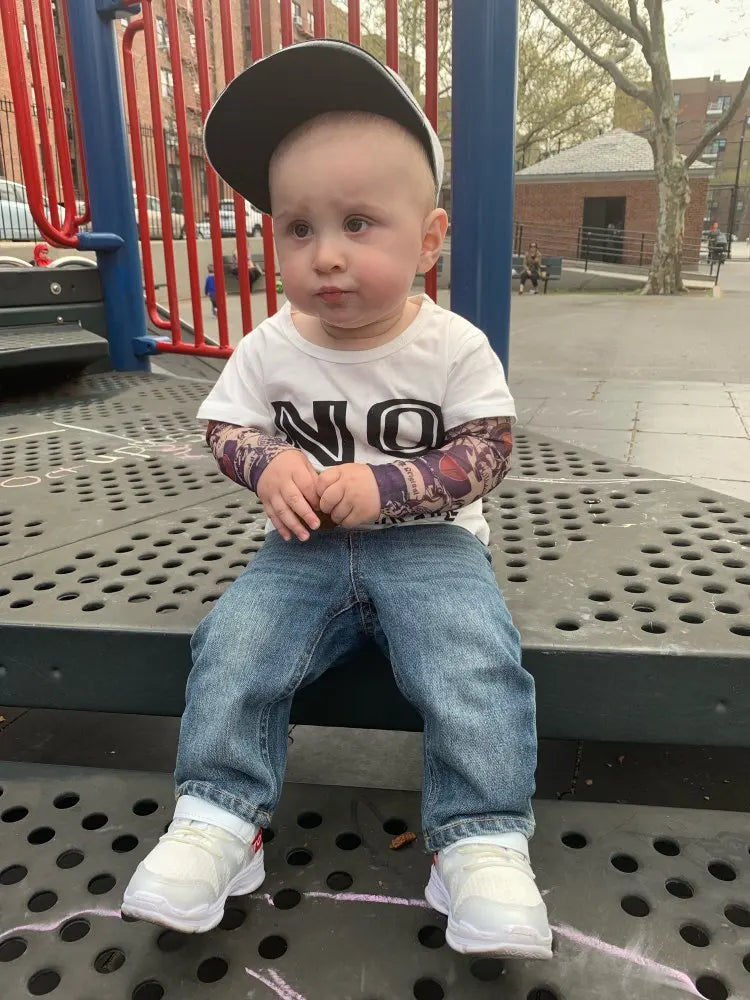 Little Rebel Inked Long Sleeve Tee – punk rock tattoo-print cotton top for future stage legends