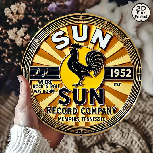 Sun Record Company logo with a rooster, held by a hand against a floral background.