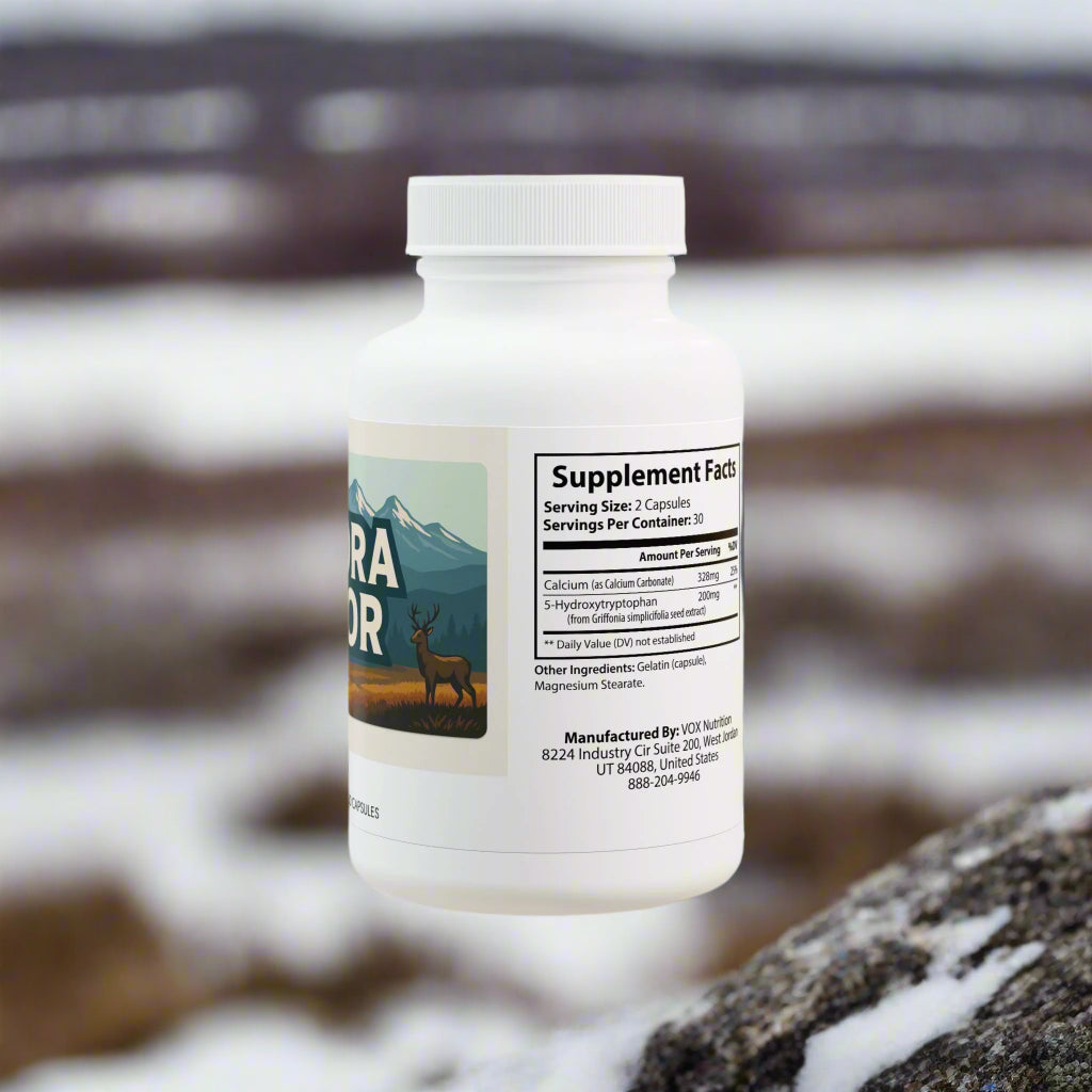 Supplement bottle with a label featuring a mountain and deer design on a white background