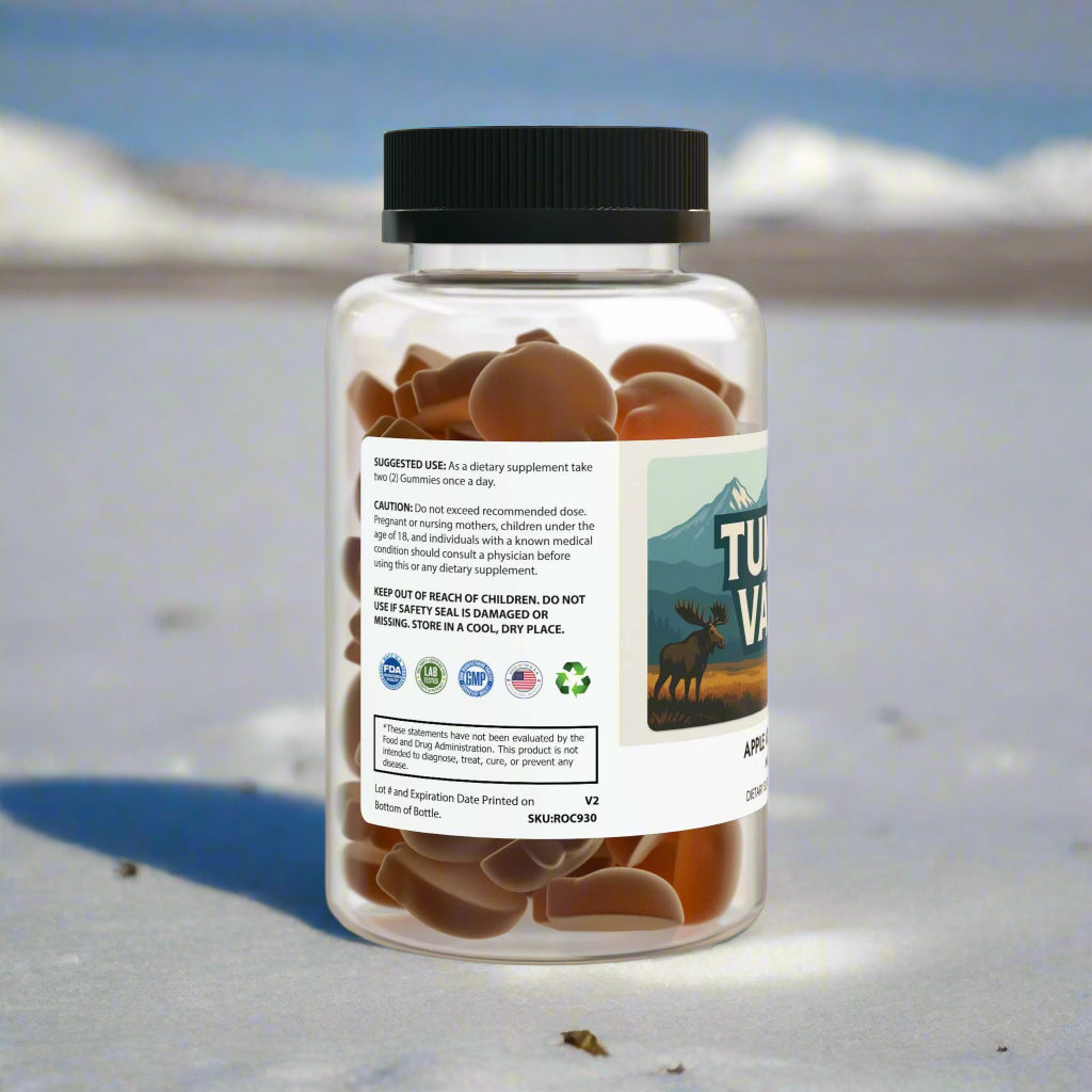 Supplement bottle with gummy bears and label on a white background