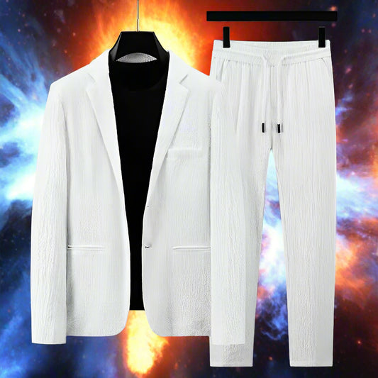 White textured blazer and pants set on hangers against a gray background