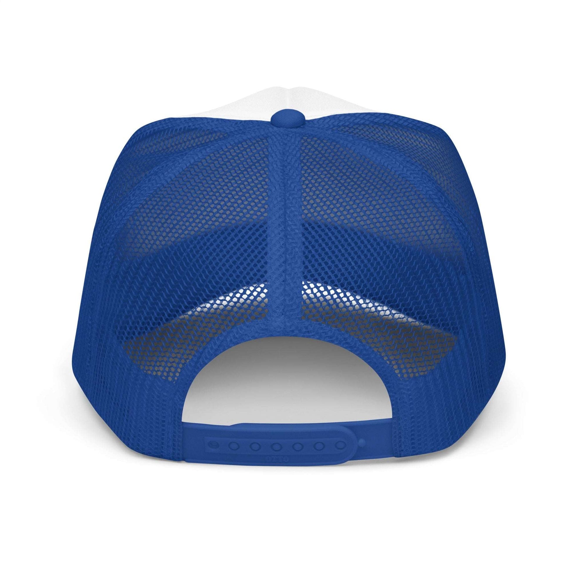 a blue hat sitting on top of a bench 