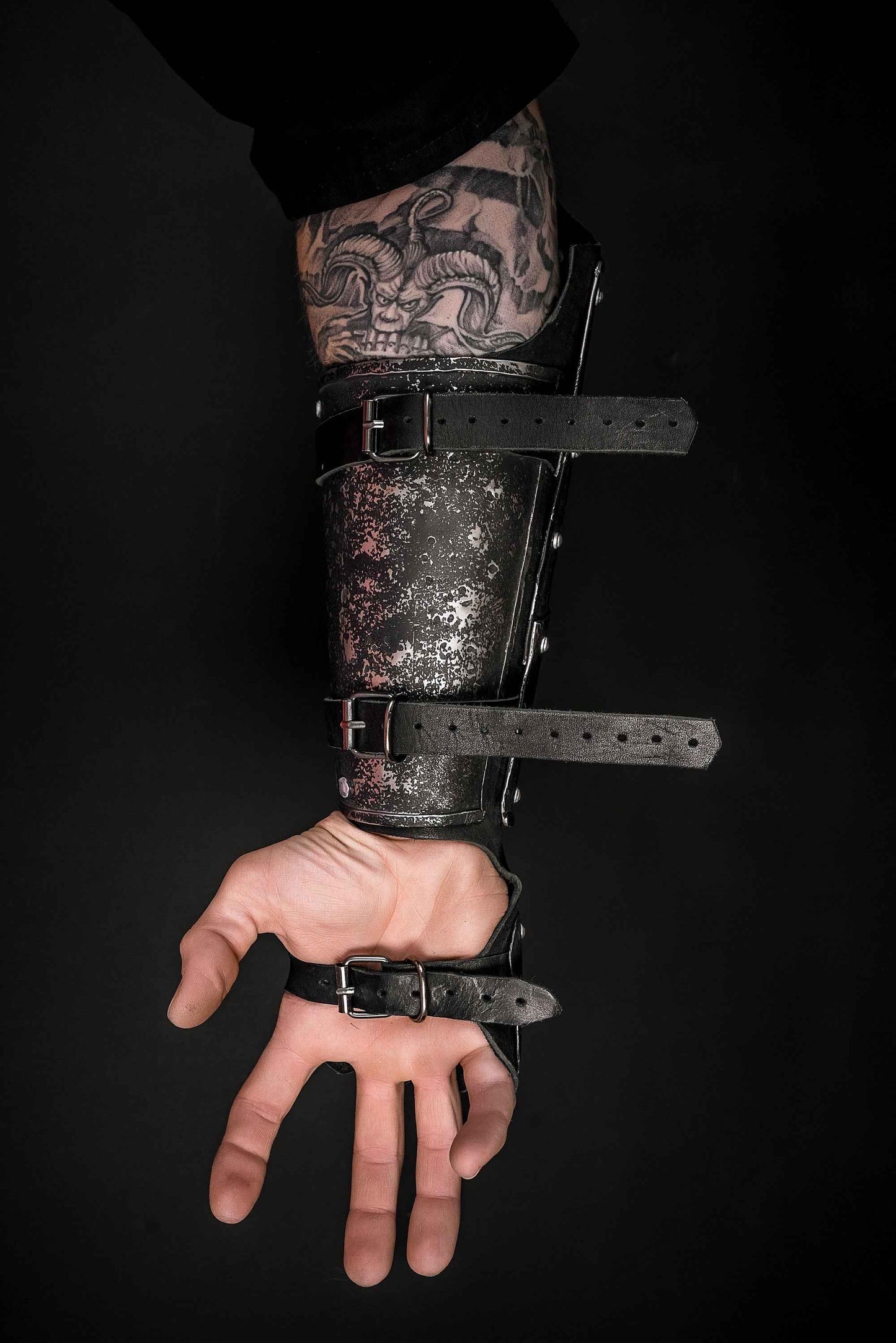 Medieval leather bracers with hand protection