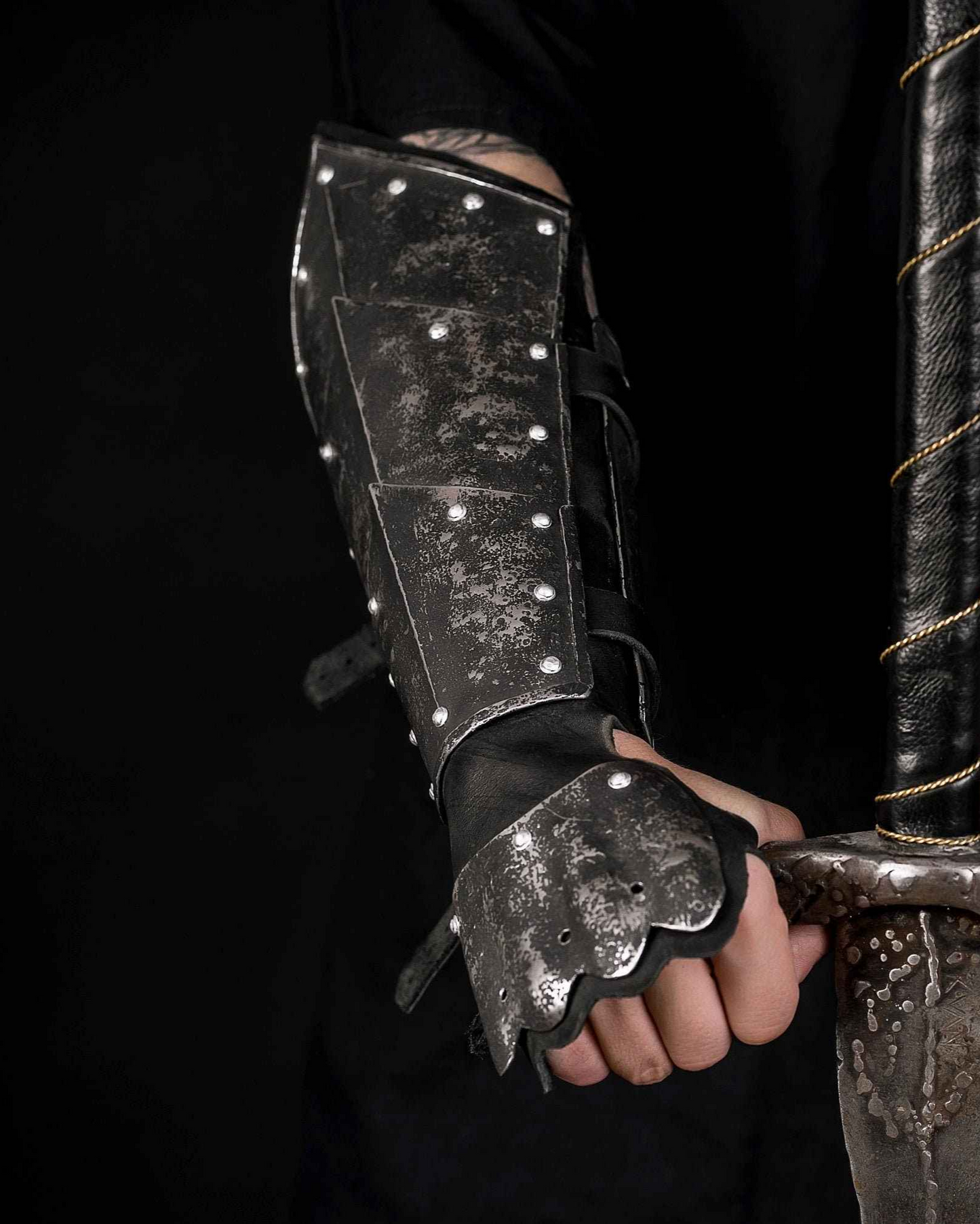 Medieval leather bracers with hand protection