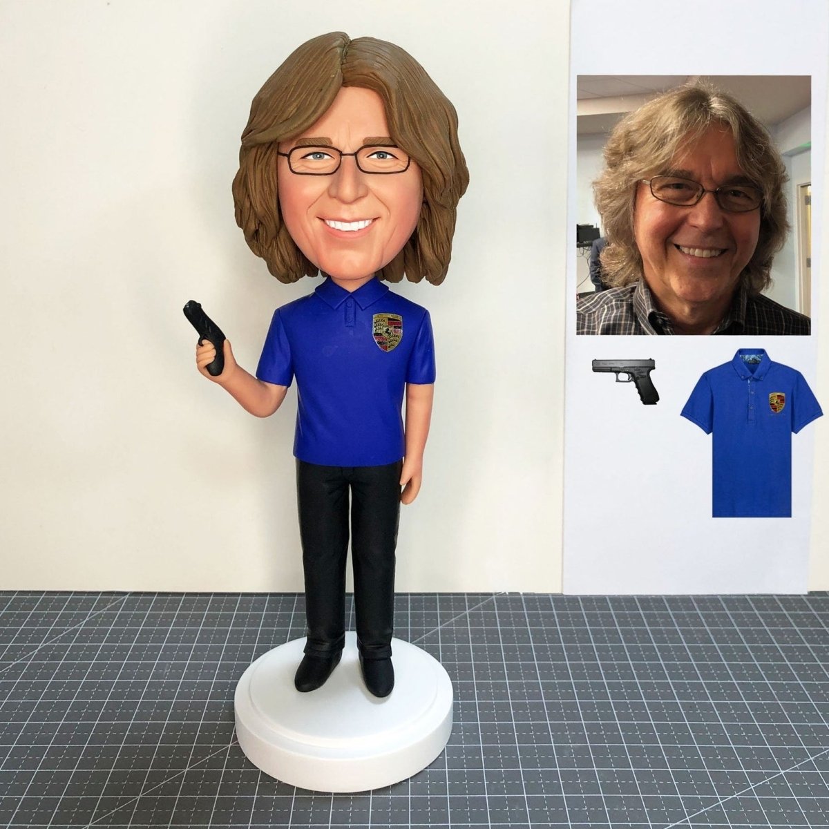 Personalized bobblehead woman holding a gun