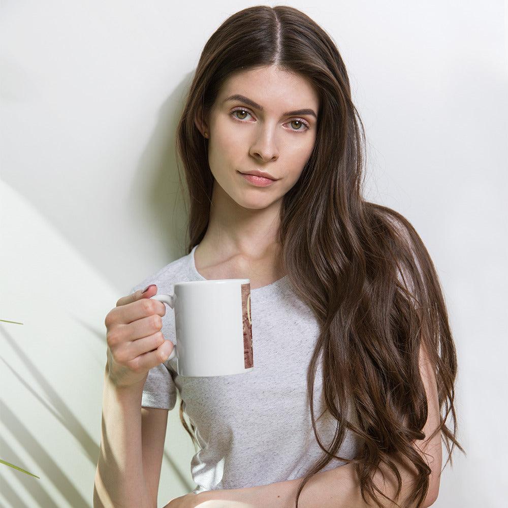 a woman holding a cup of coffee 
